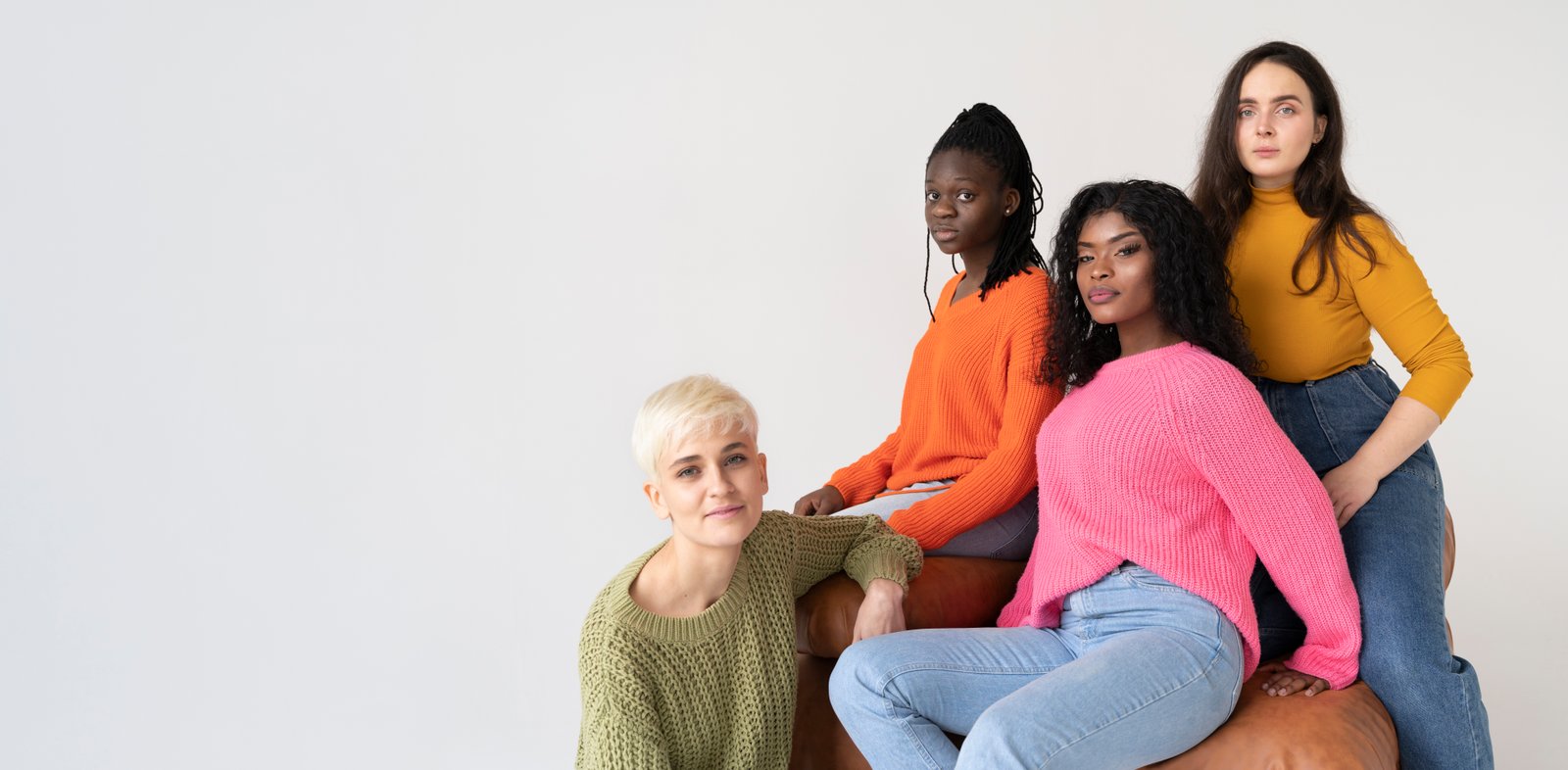 Diverse women standing together — HerBraces community